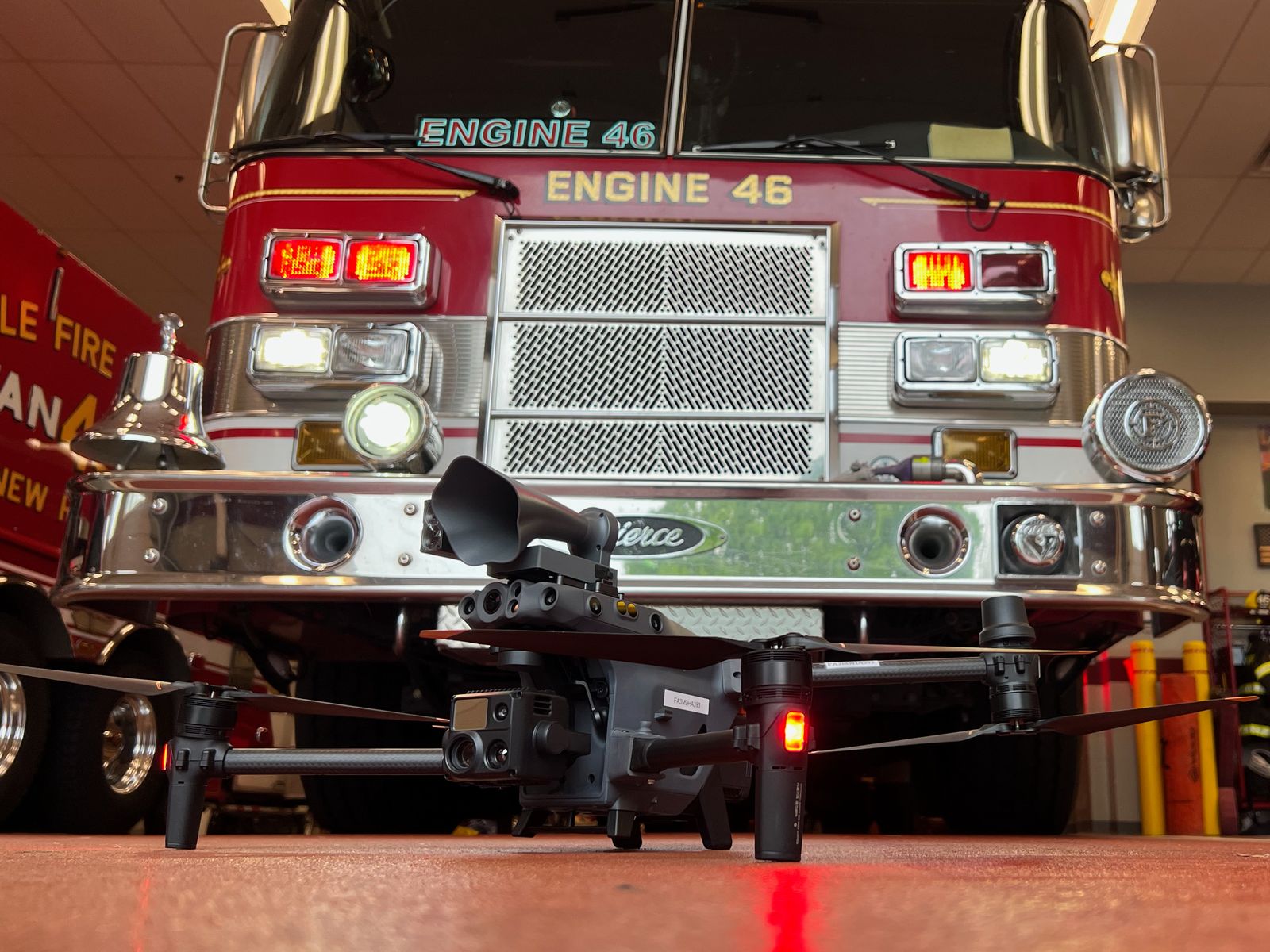 A public safety drone on the apparatus floor in front of Engine 46 at the New Hope Eagle Fire Company